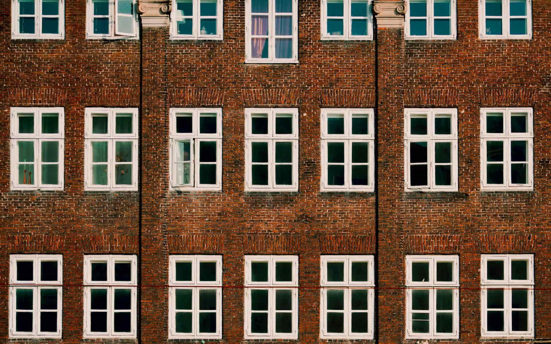 Immobilienfassade — TXM ist spezialisiert auf strategische Ankäufe und Kapitalmanagement bei dänischen Immobilien